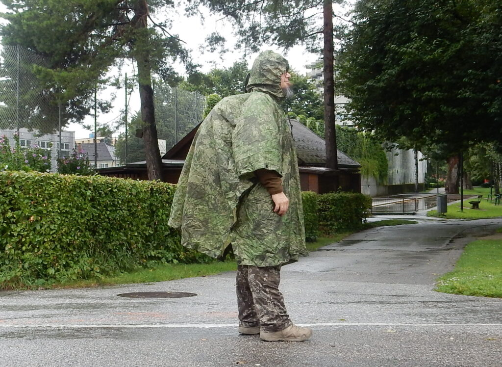 You can wear a poncho over a backpack to keep it dry
