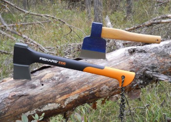 Two axes in a piece of wood