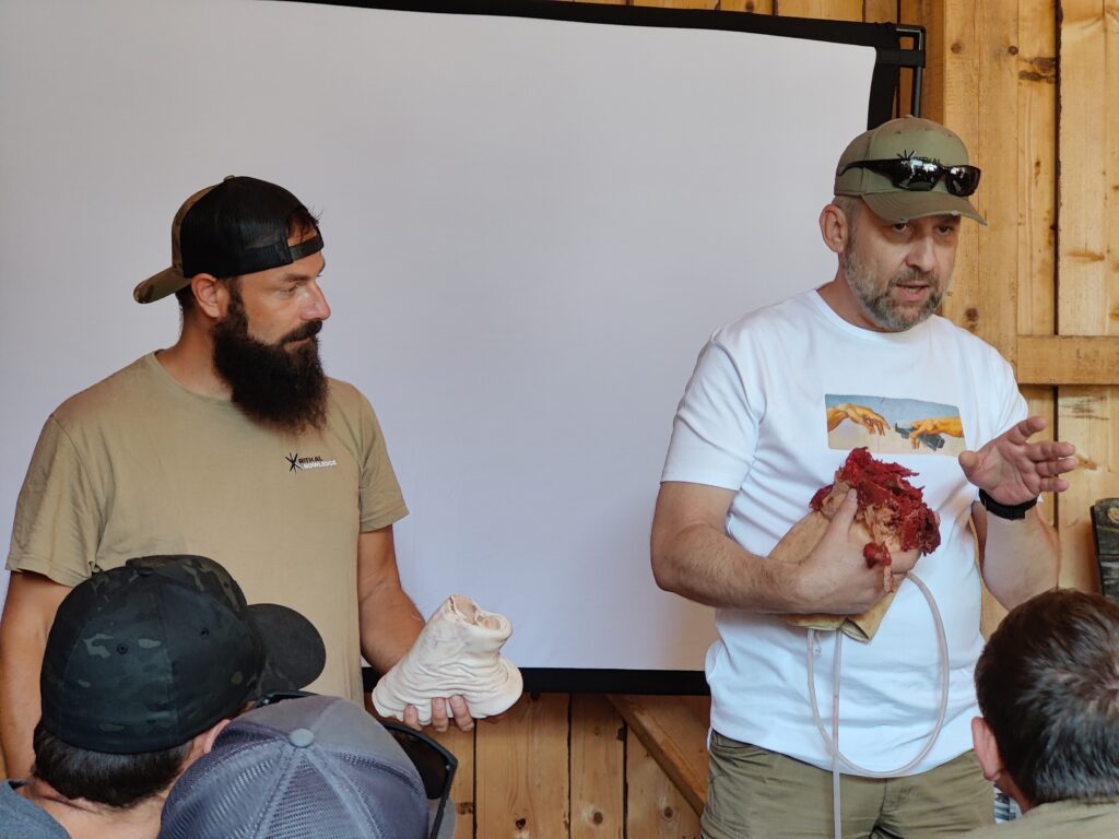 Trainers showing different simulated wounds