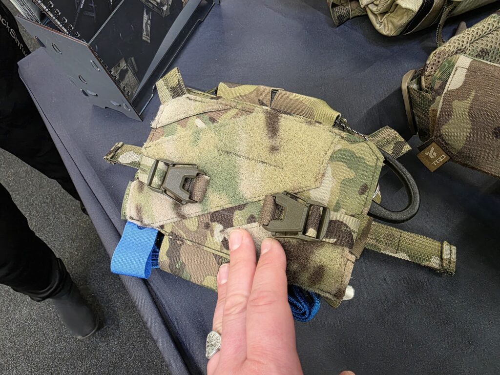 Quick release buckles for shears on the outside